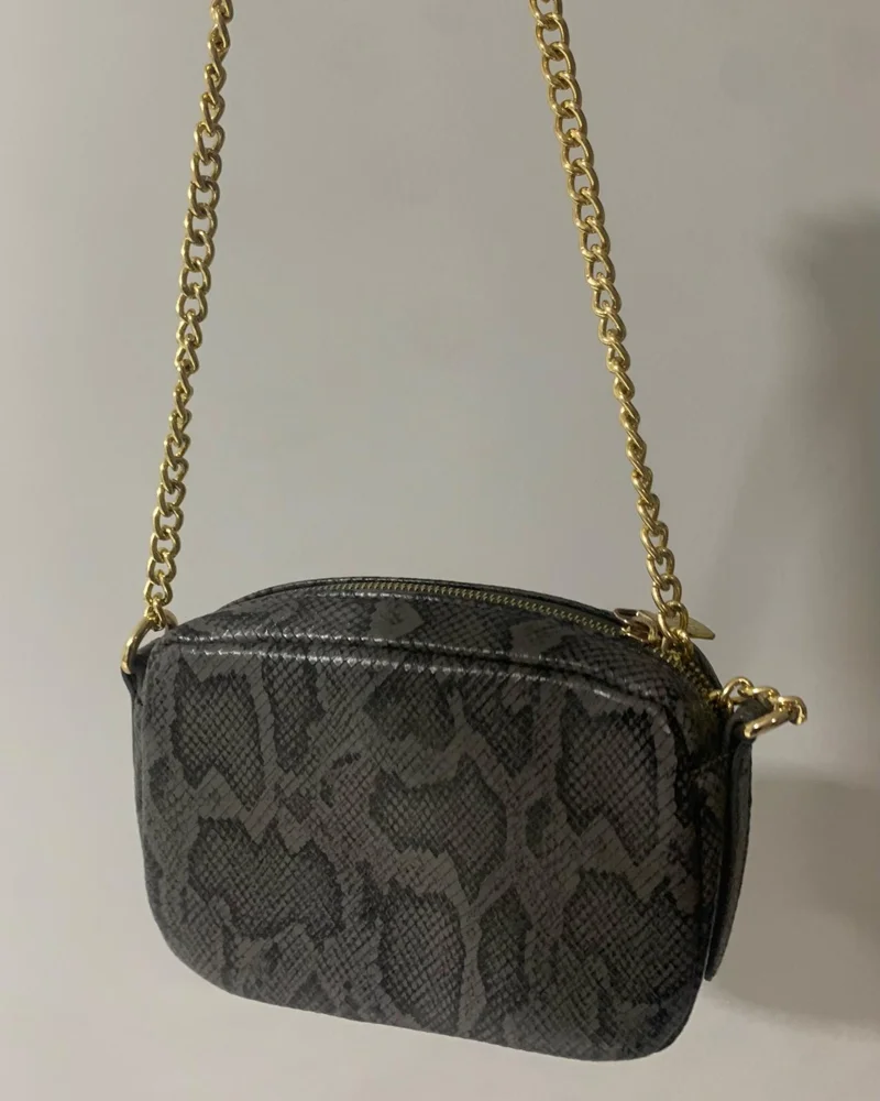deja vu Cross-Body Bag