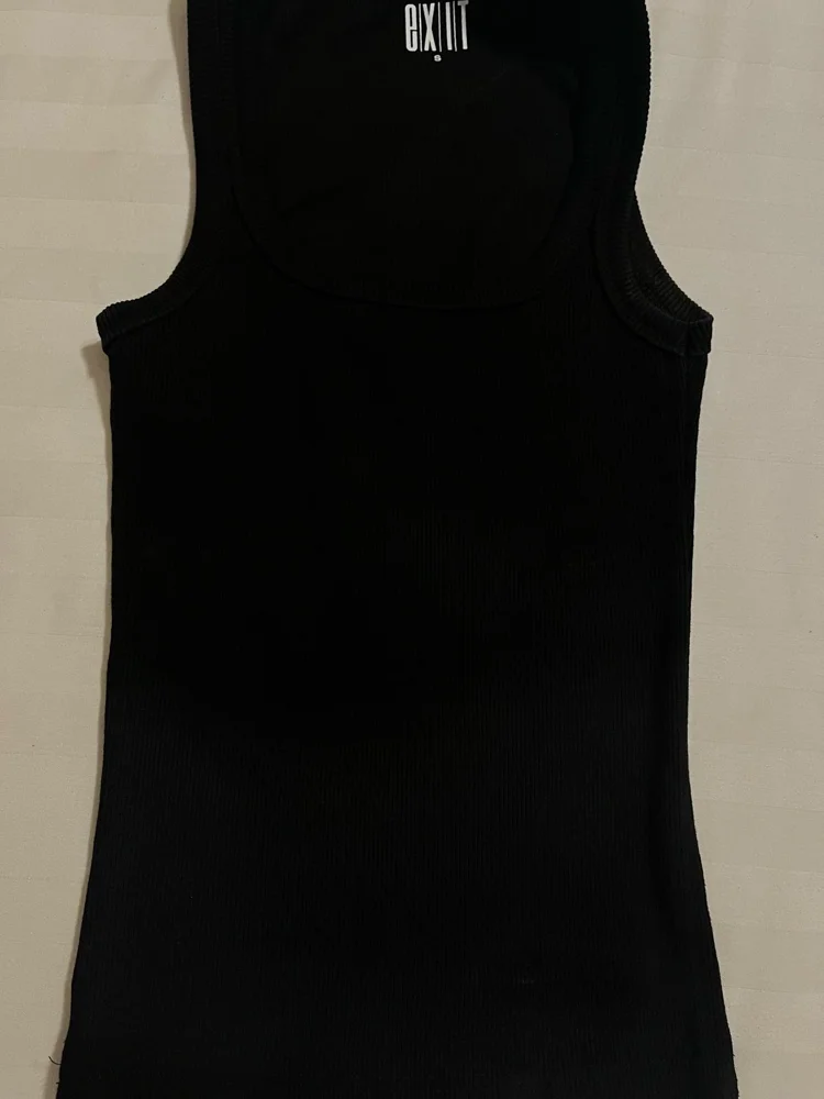 e(x)it Tank Tops